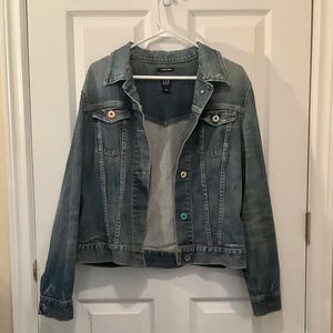 Authentic blue denim jacket with pastel hardware.